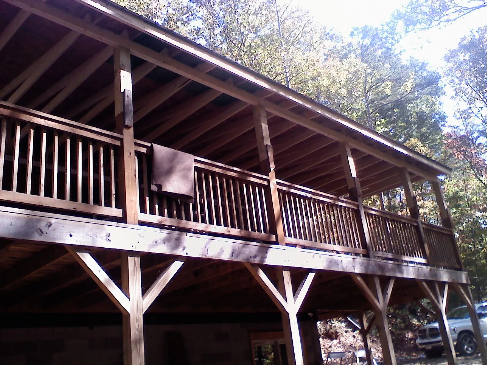 Timber framing under a new elevated porch and deck — Roof Leak Repair in East Dubuque by Roofing Brothers